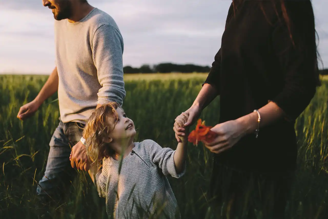 Family in the grass field